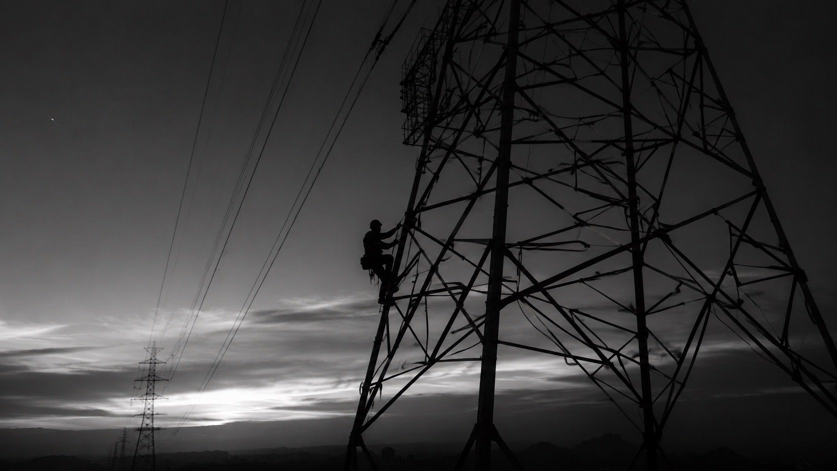 Transmission tower at dusk